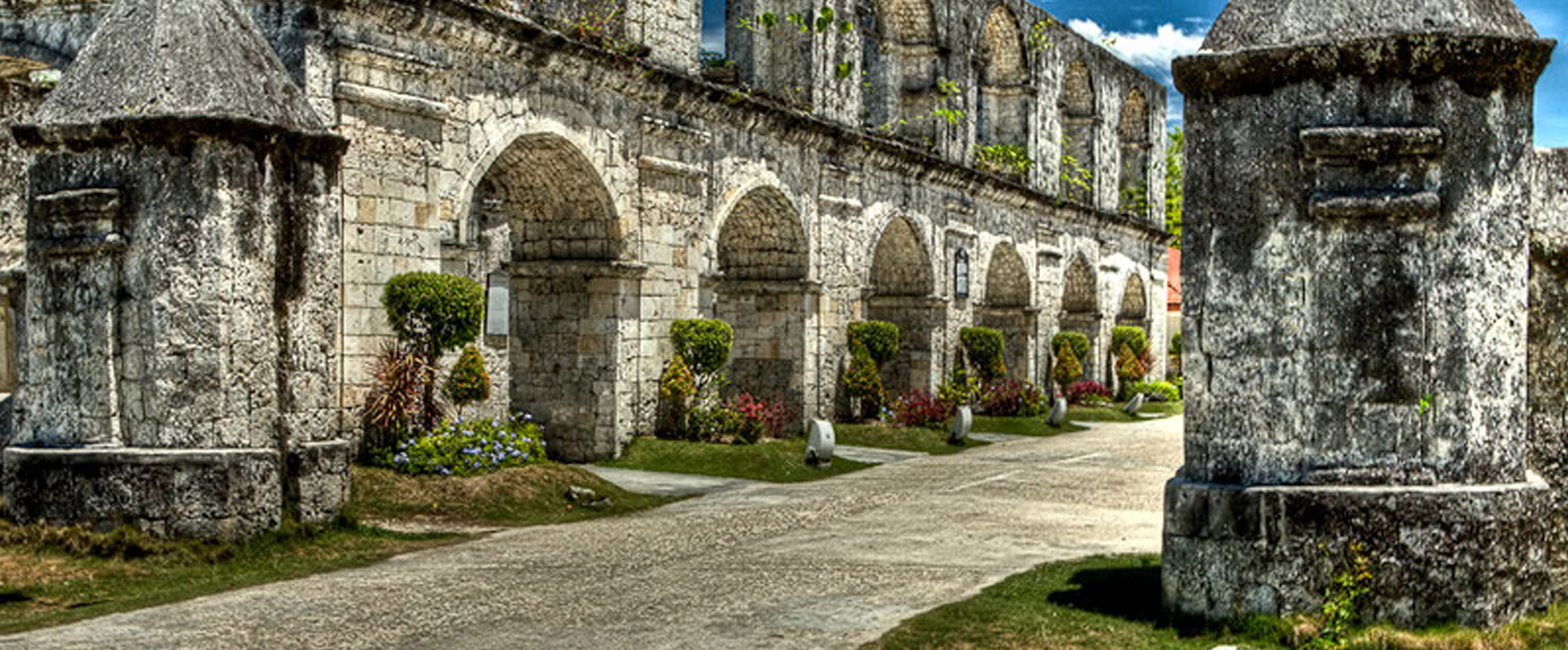 Historic stone architecture with beautiful gardens